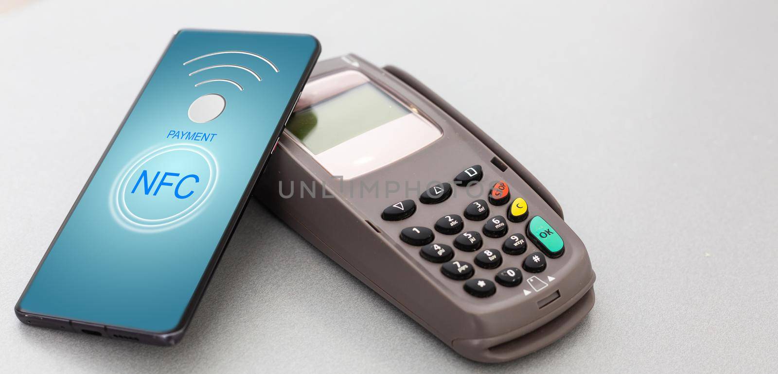 terminal for contactless payment with smartphone on white background