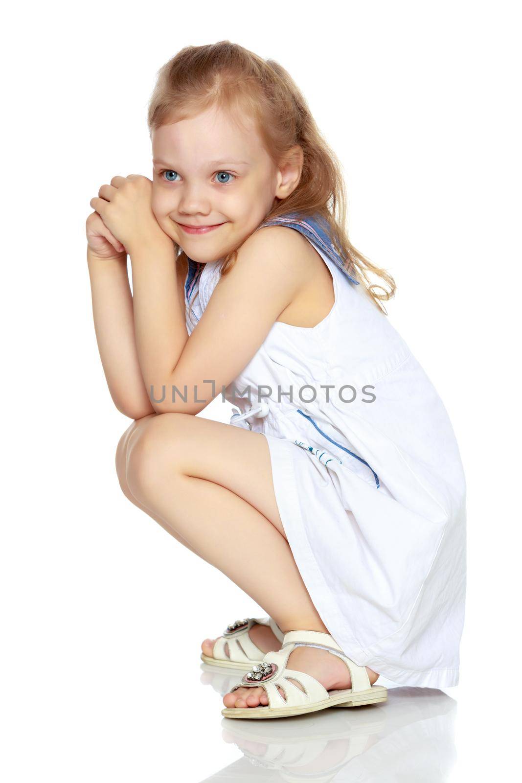 Beautiful little girl. The concept of a happy childhood, family well-being. Isolated on white background.