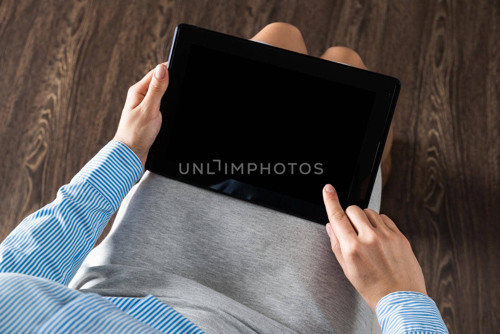 business woman with tablet on her lap by adam121