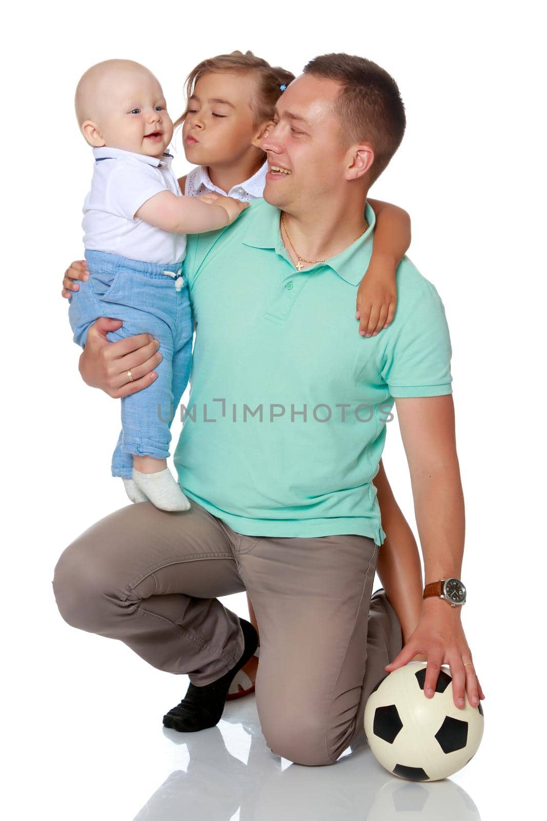 Happy dad with young children. by kolesnikov_studio