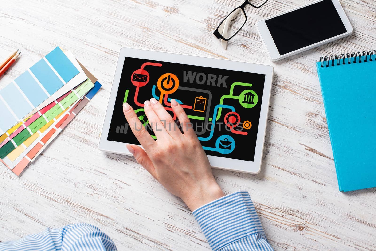 Business lady sitting at desk with tablet computer. Mobile smart devices in business processes. Business occupation and innovation. Corporate office workplace with business woman at wooden desk.