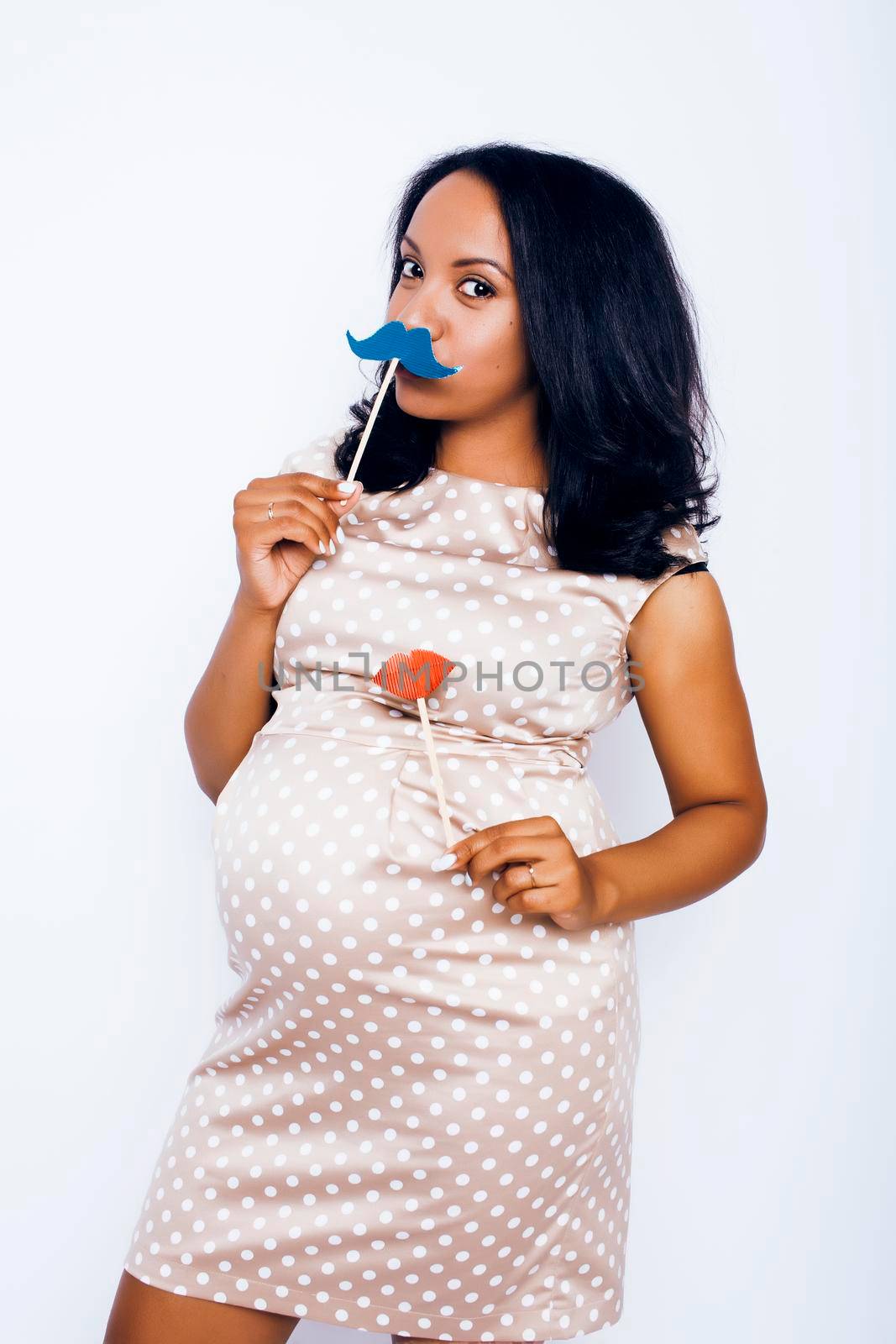 young pretty african american woman pregnant happy smiling, posing on white background isolated , lifestyle people concept copyspace