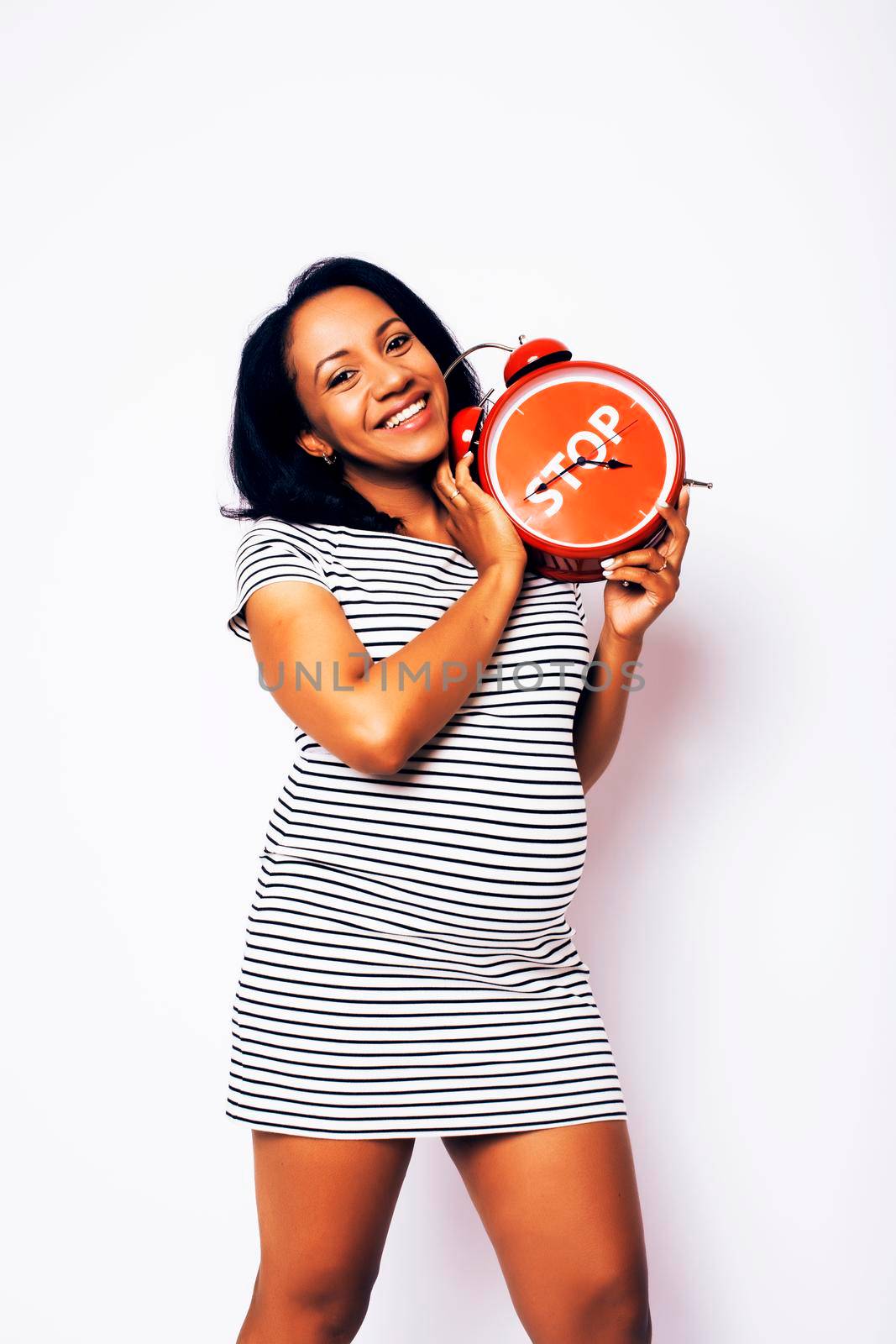 pretty young african-american pregnant woman posing isolated on white background, lifestyle people concept close up