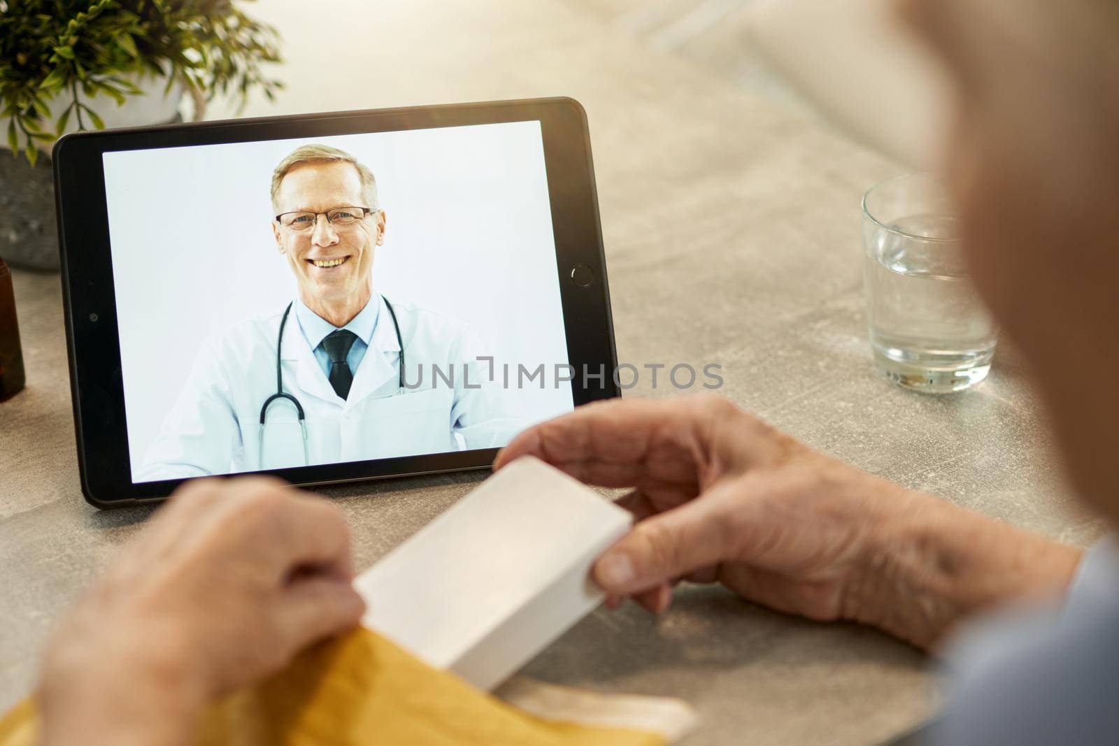 Remote online consultation from a friendly doctor by friendsstock