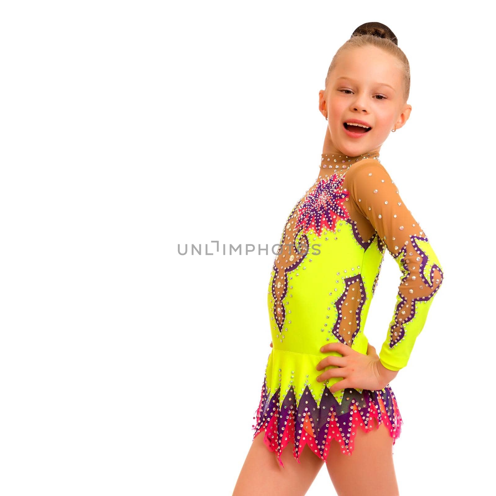 Little girl gymnast close-up. by kolesnikov_studio