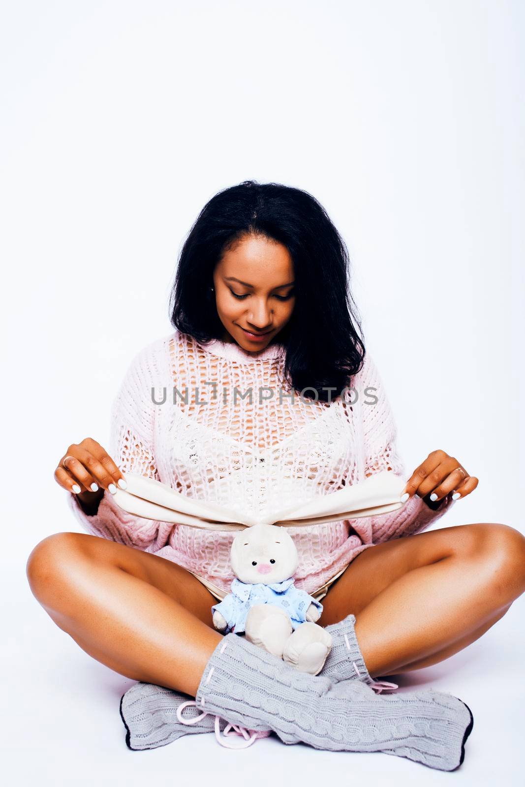 young pretty african american woman pregnant happy smiling, posing on white background isolated , lifestyle people concept copyspace close up