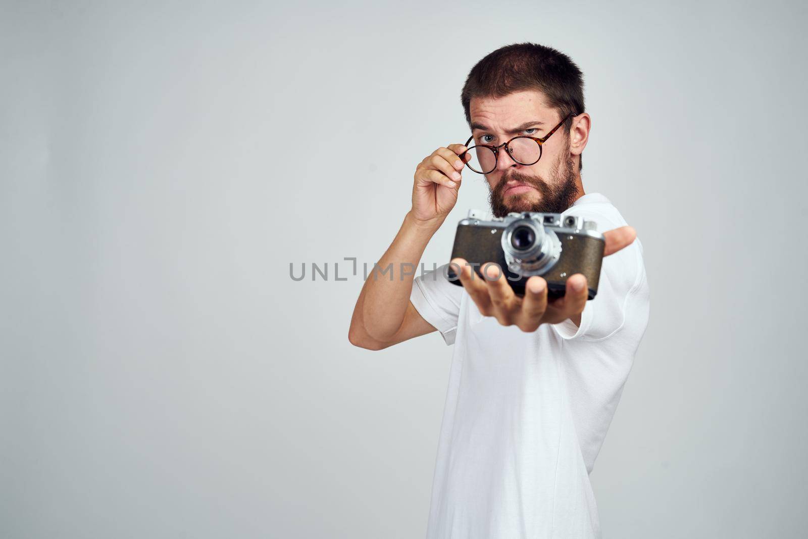 male photographer with camera office object lifestyle by Vichizh