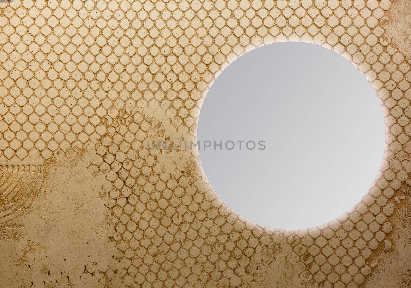 round mirror on wooden background