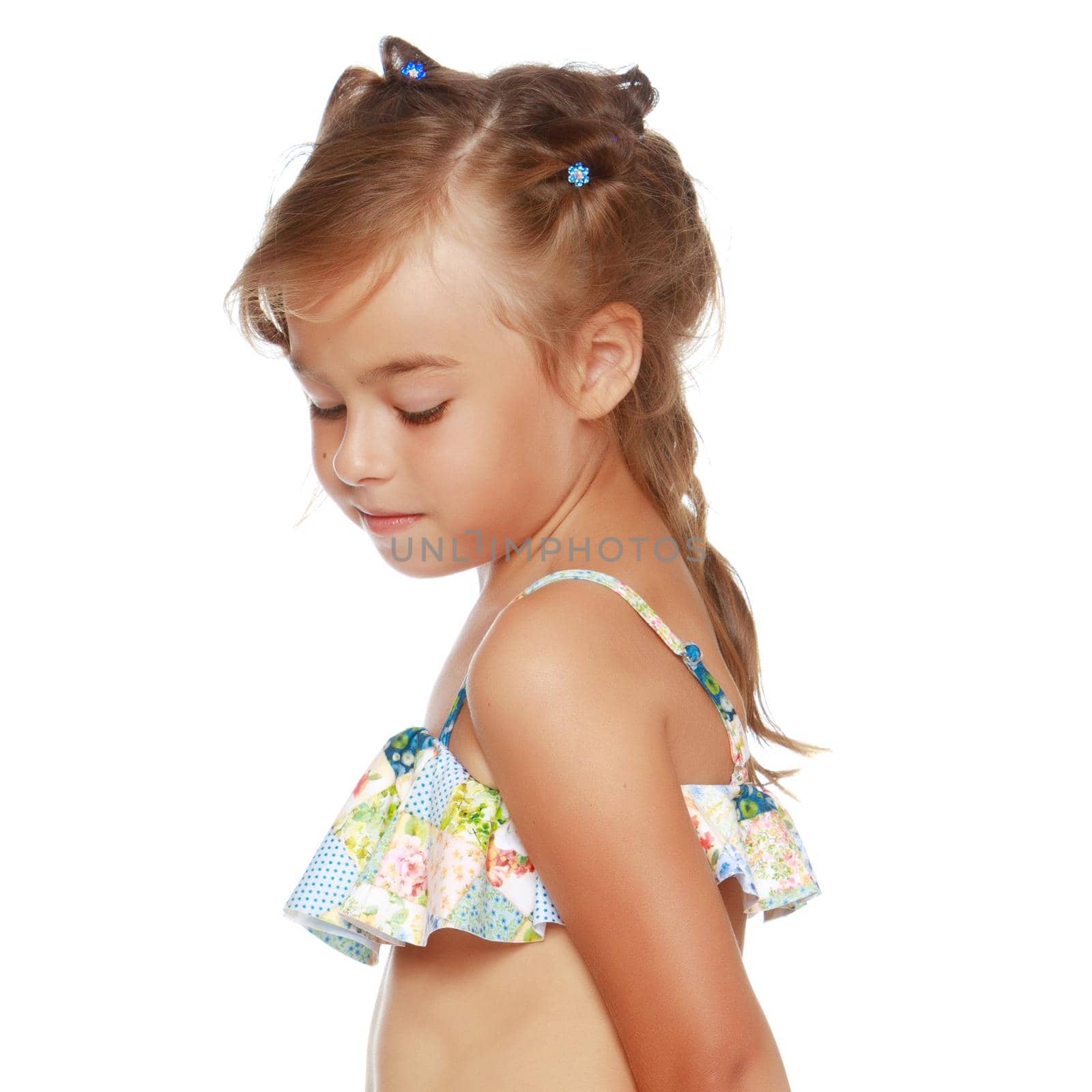 Tanned little girl in a swimsuit by kolesnikov_studio