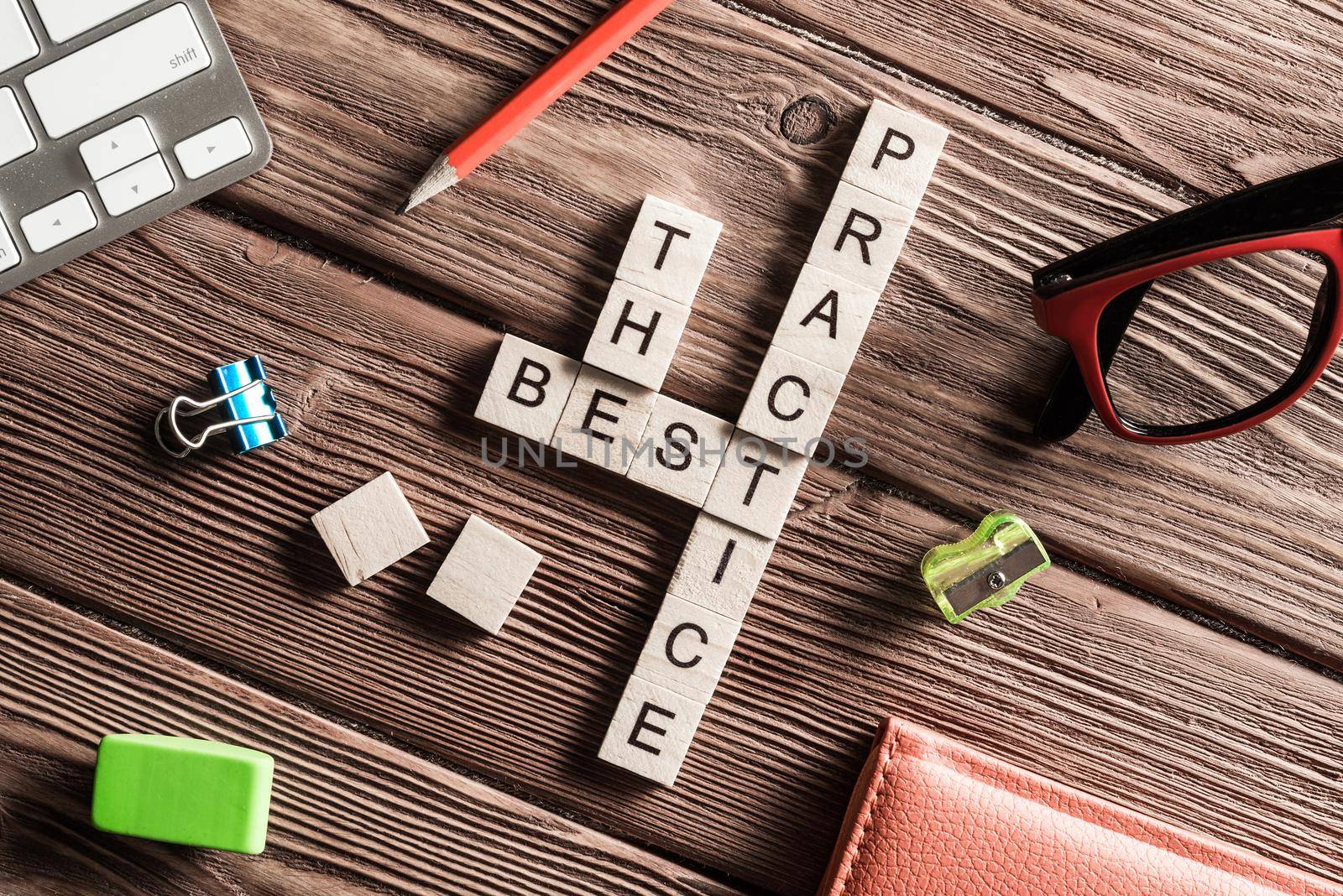 Words of business marketing collected in crossword with wooden cubes