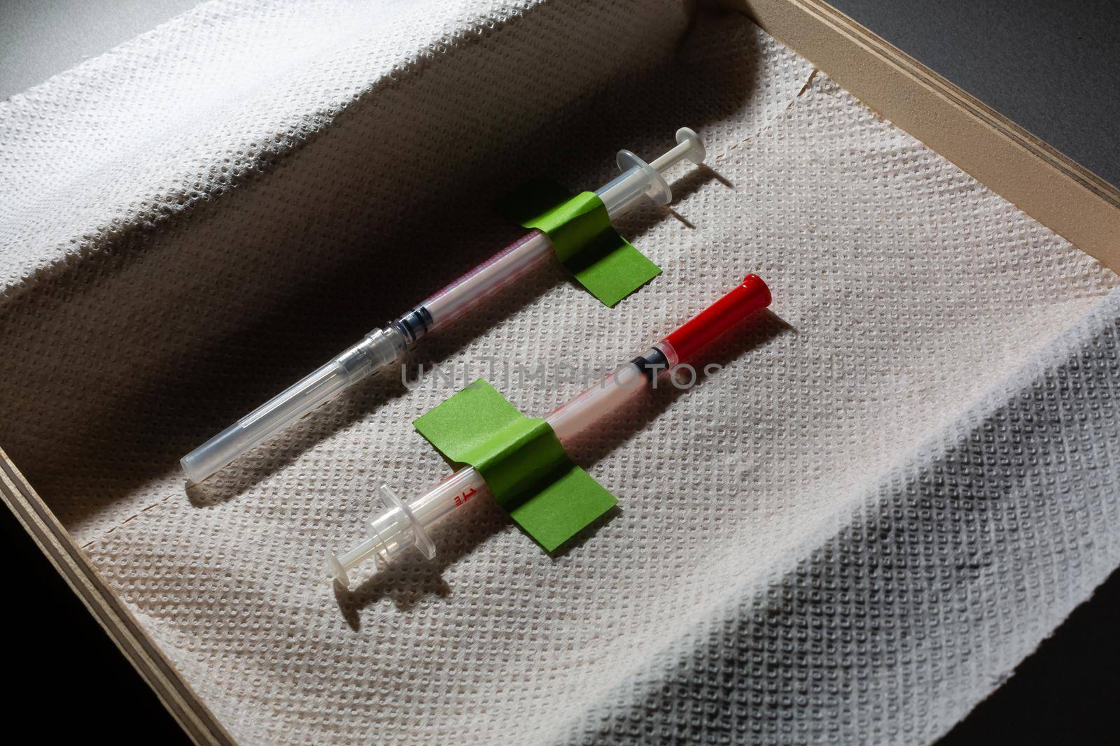 insulin syringelying in box. Set for diabetic.