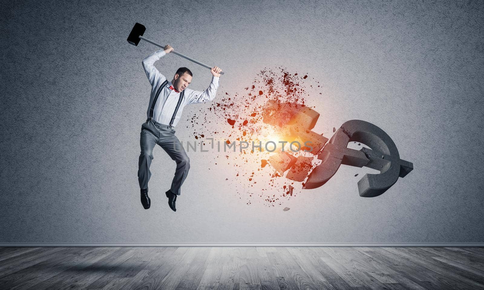 Young furious businessman crashing with hammer stone dollar symbol