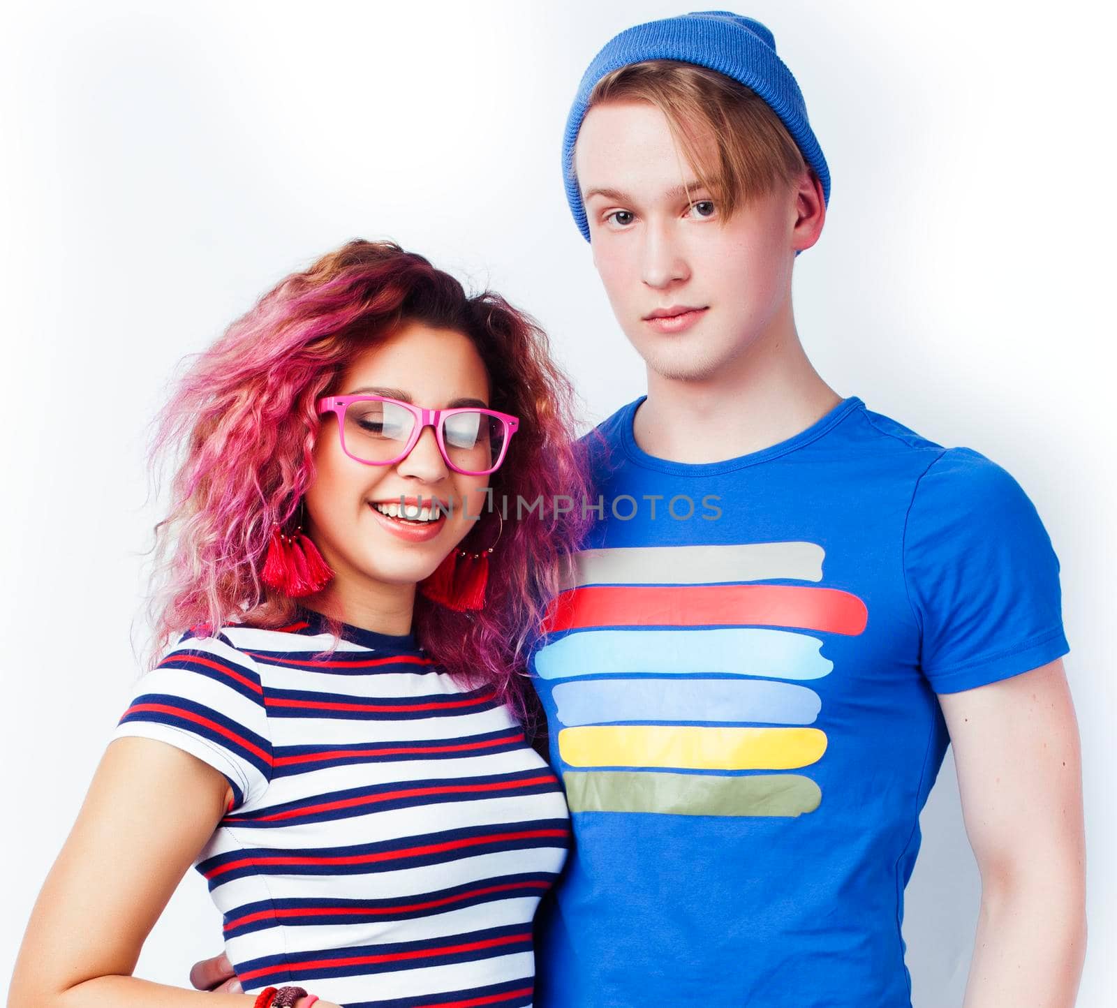 best friends teenage girl and boy together having fun, posing emotional on white background isolated, latin american and caucasian close up