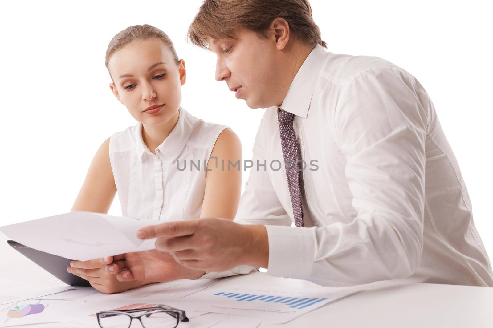 Photo of confident employees discussing papers at meeting. Isolated over white background.