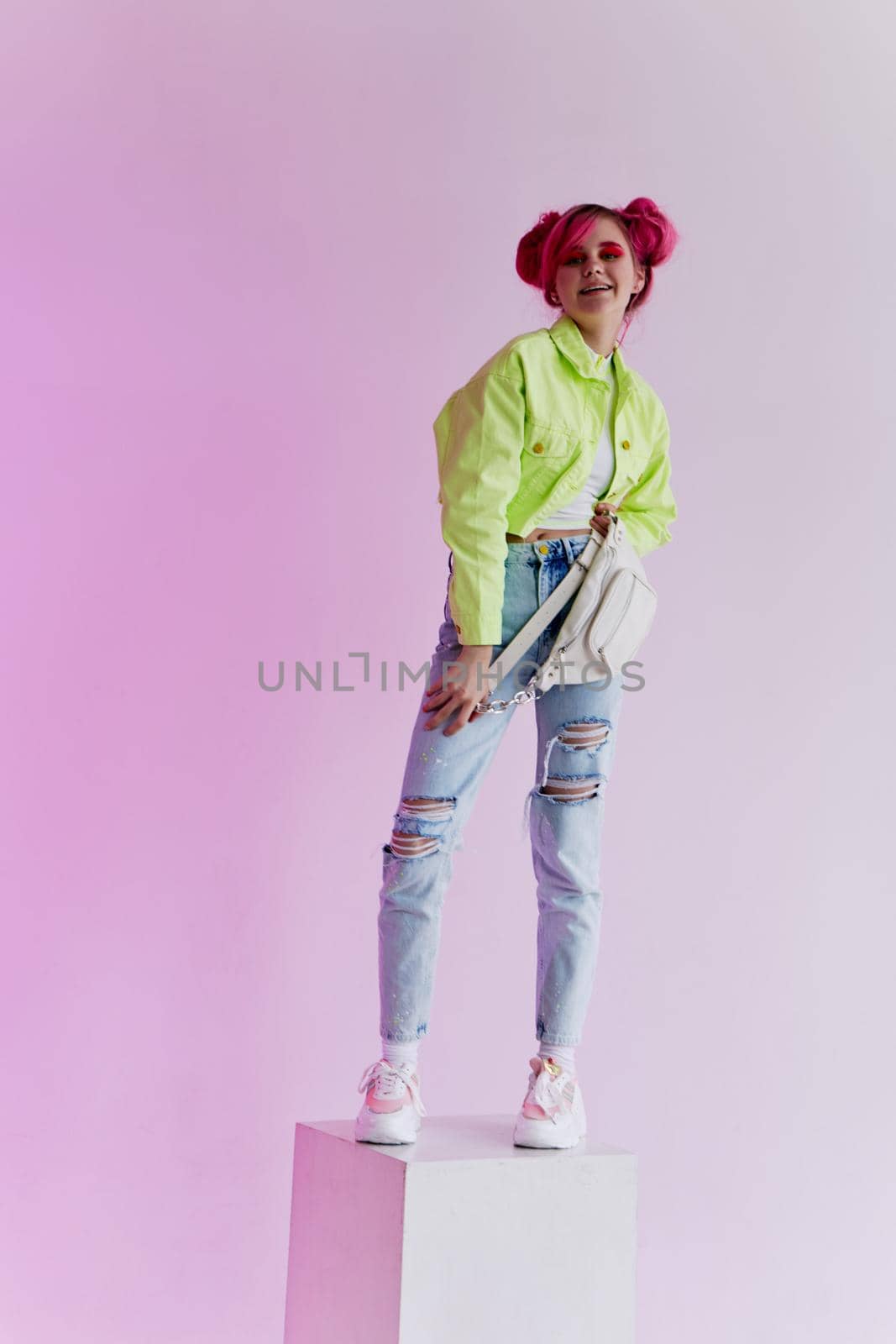 fashionable woman pink hair posing fashion clothes Acid style design. High quality photo