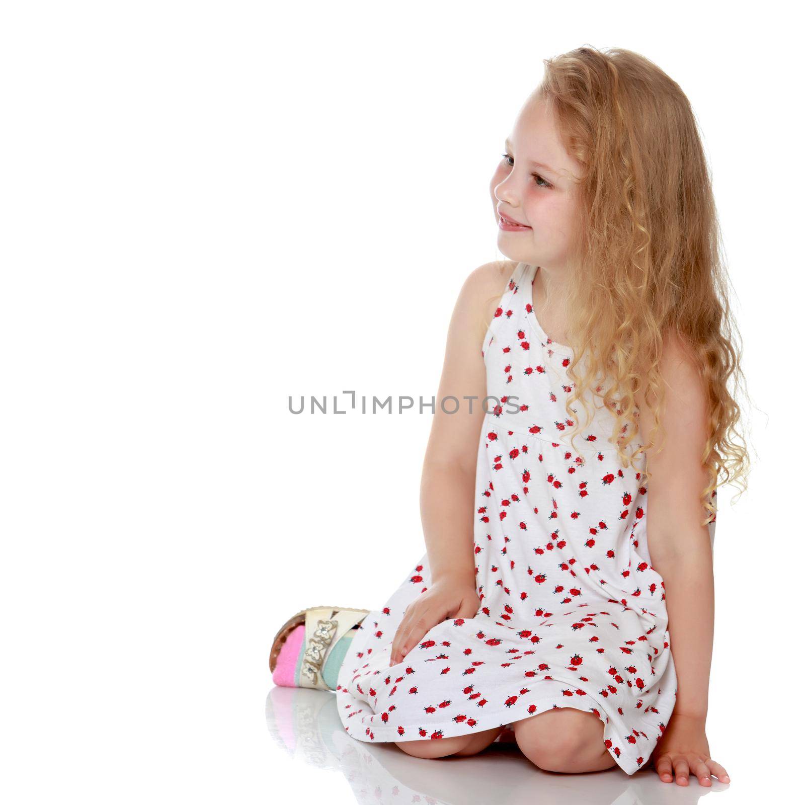 Sad little girl concept of the meaning of life and psychological adaptation of the child in the family and society. Isolated over white background