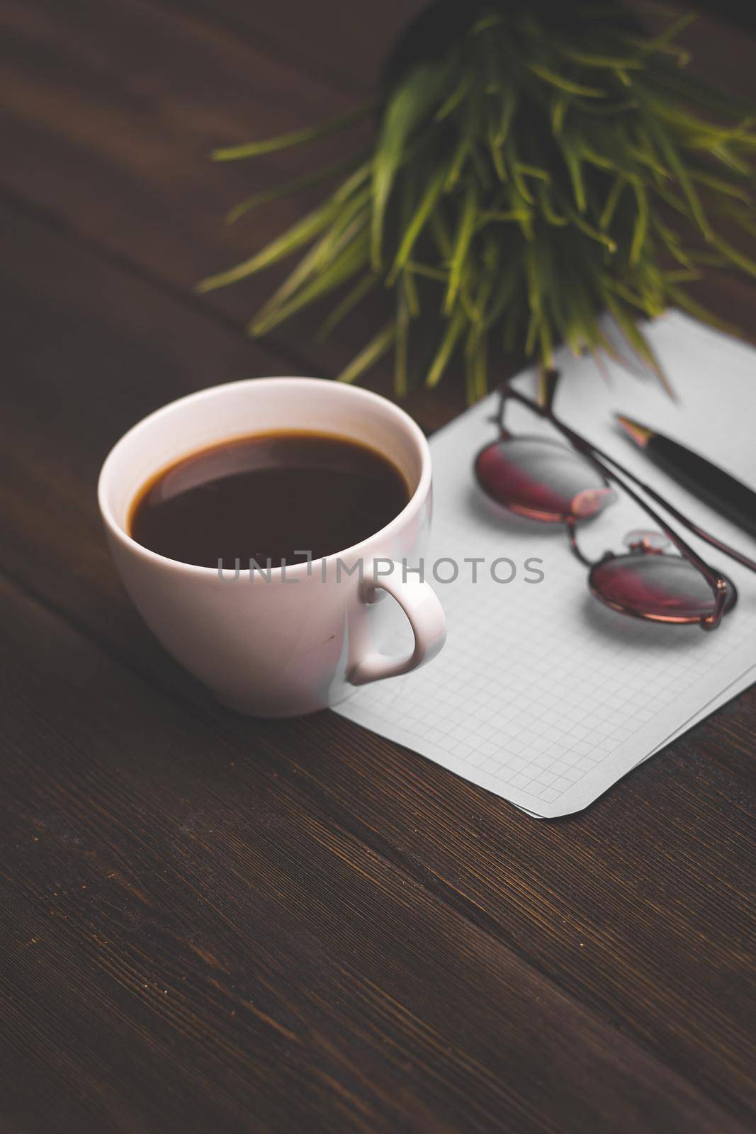 a cup of coffee notepad handle cafe the view from the top. High quality photo