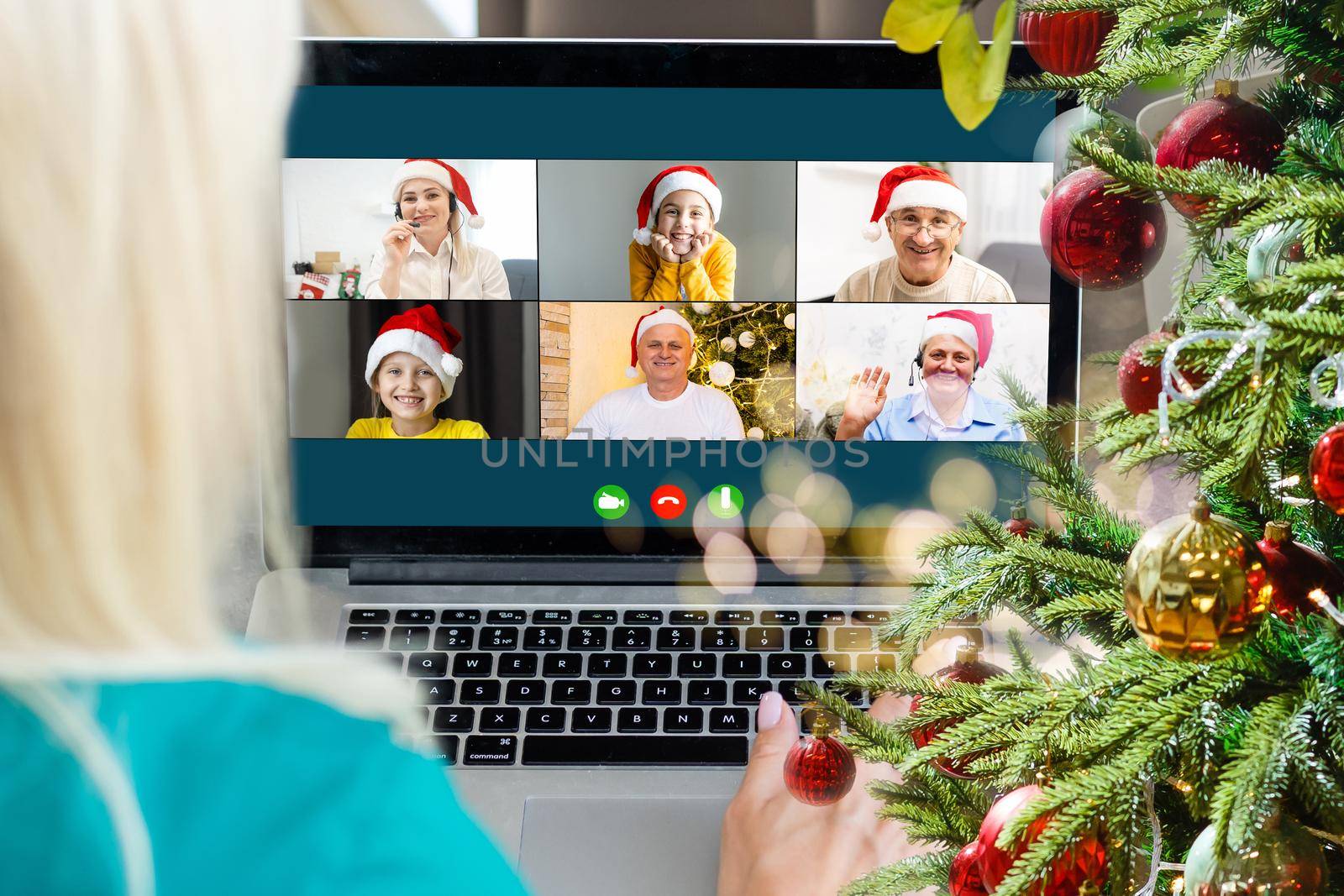 woman hands with computer, video call at christmas.