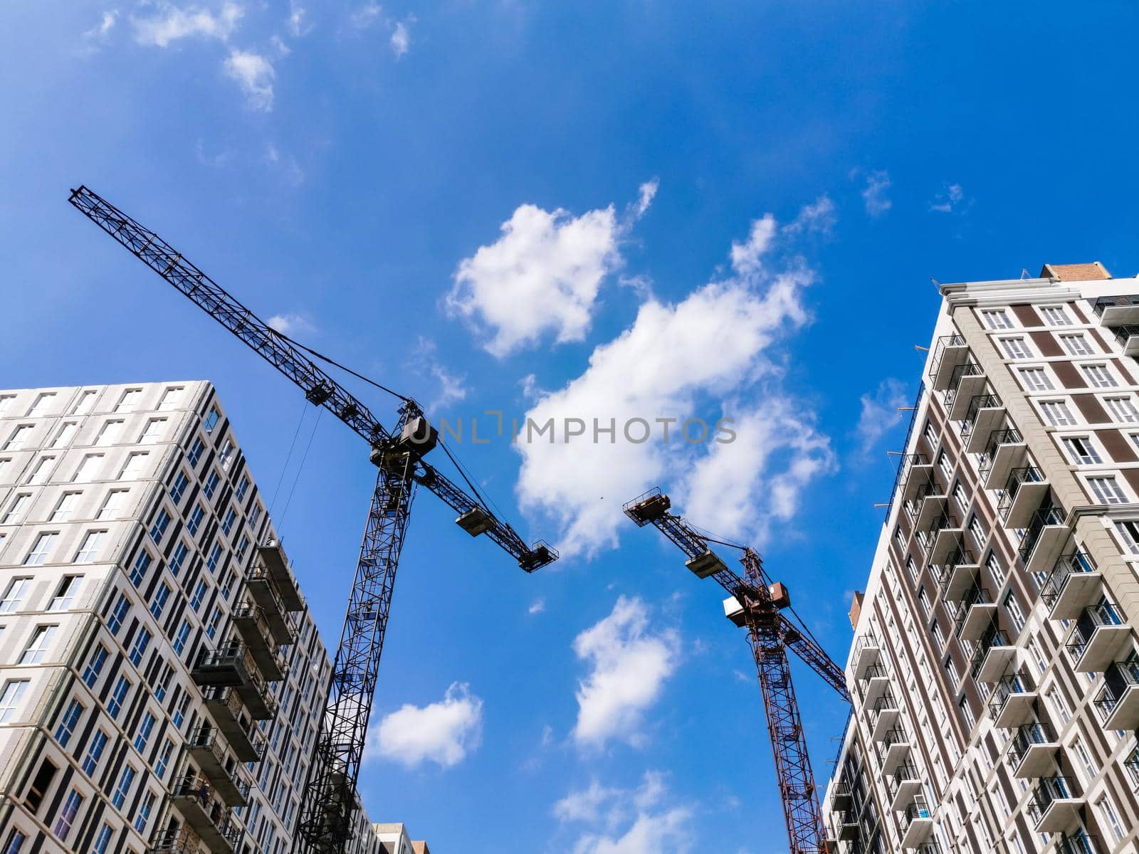 facade two cranes building