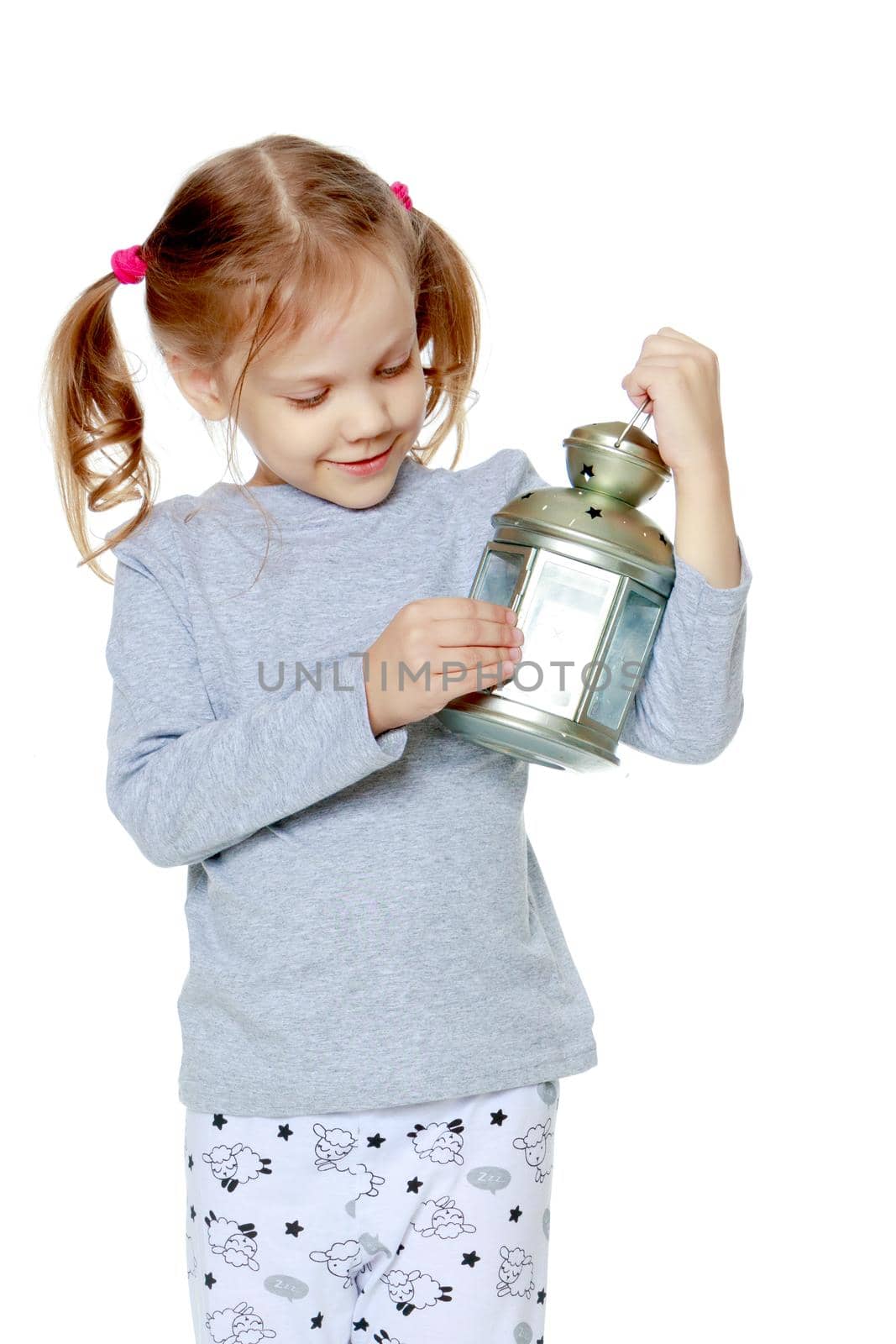 Little girl in pajamas. Concept of family happiness, child, isolated on white background.