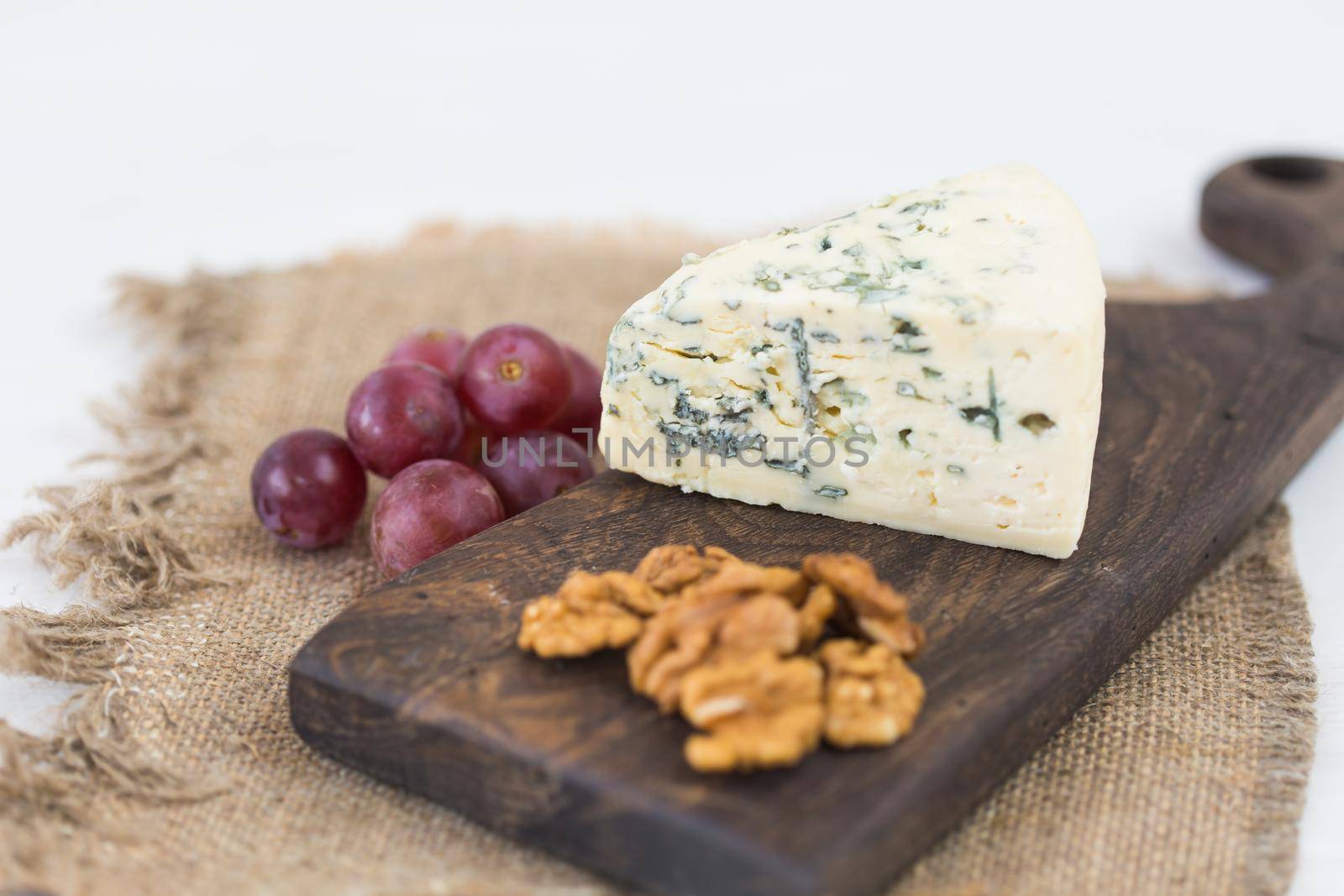 Blue cheese or brie with grapes and nuts by Satura86