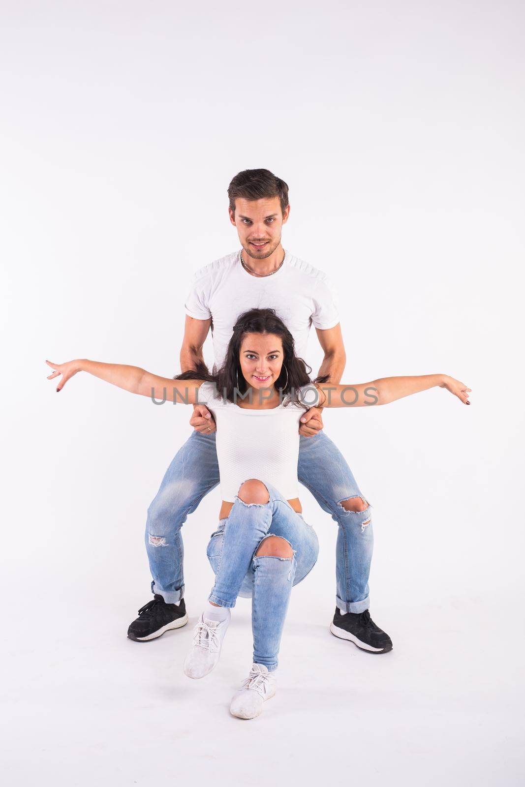 Salsa, kizomba and bachata dancers on white background. Social dance concept by Satura86