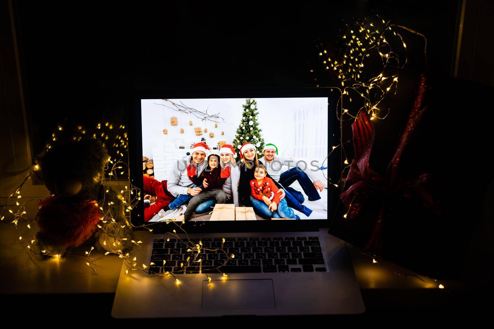 Head shot portrait attractive family make video conference call at christmas, distant interaction using modern tech concept by Andelov13