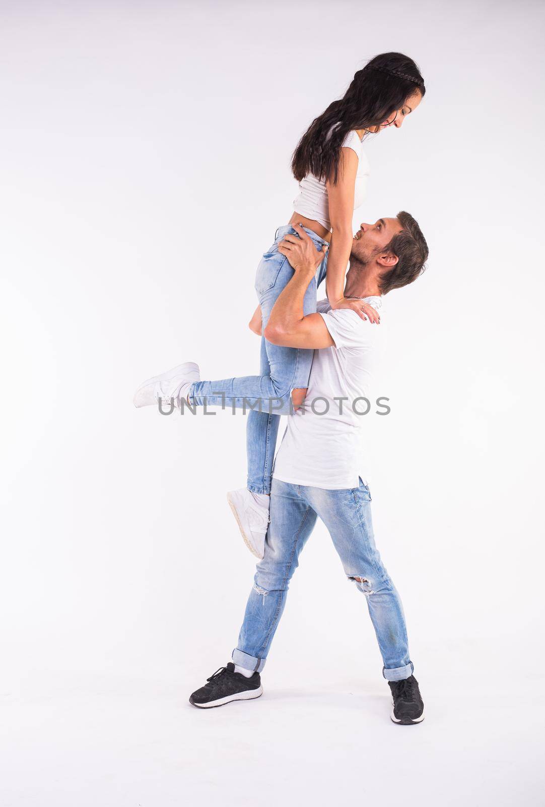 Salsa, kizomba and bachata dancers on white background. Social dance concept by Satura86