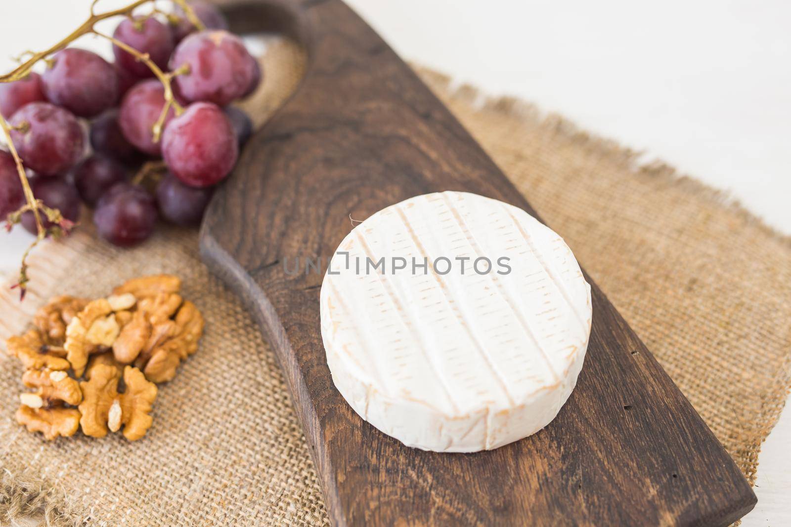 Blue cheese or brie with grapes and nuts by Satura86