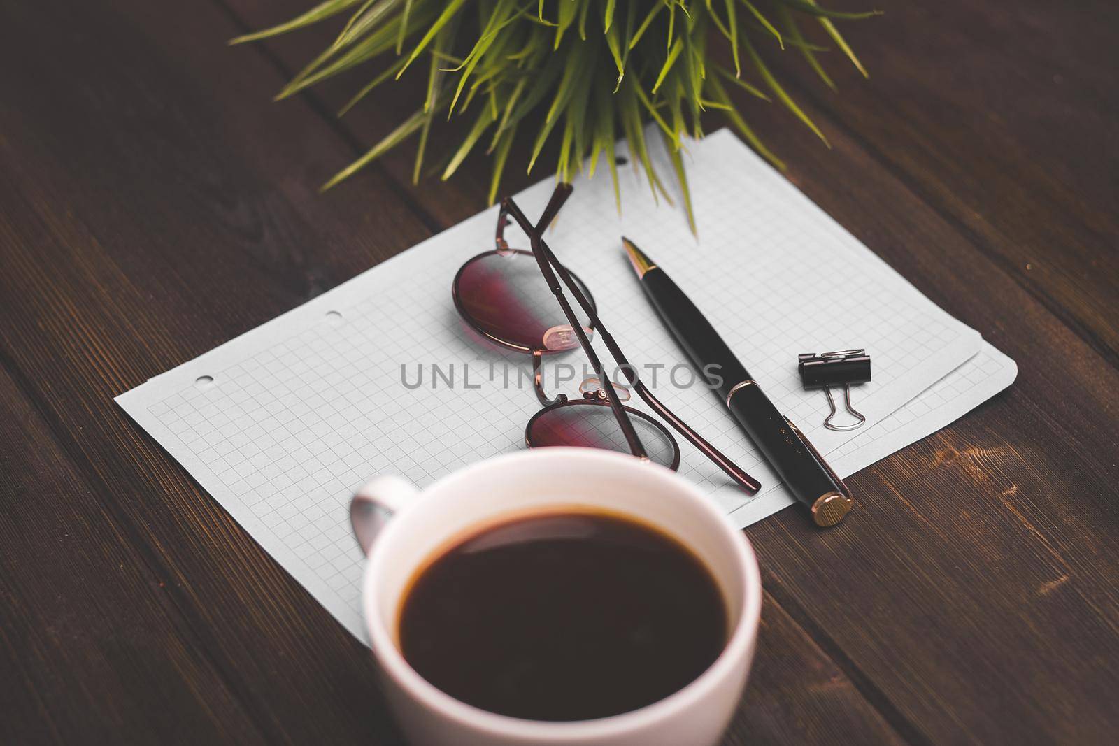 notebook with pen coffee cup papers accessories wooden table. High quality photo