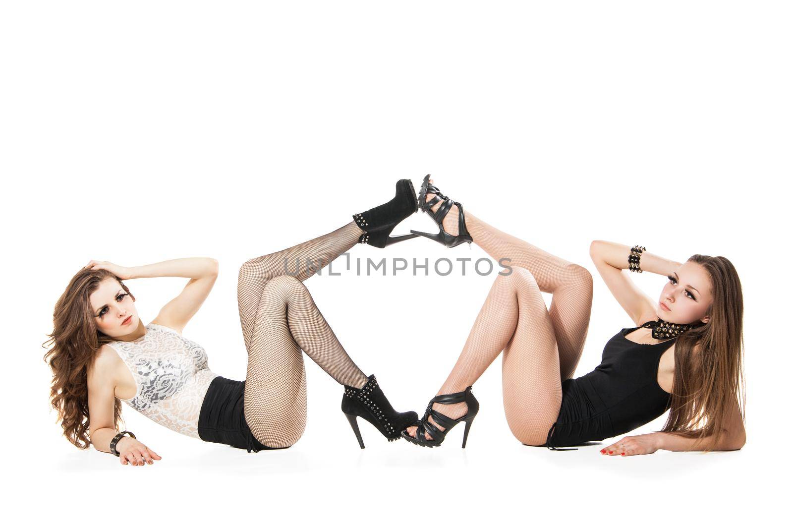 alluring go-go dancers woman posing isolated against white background