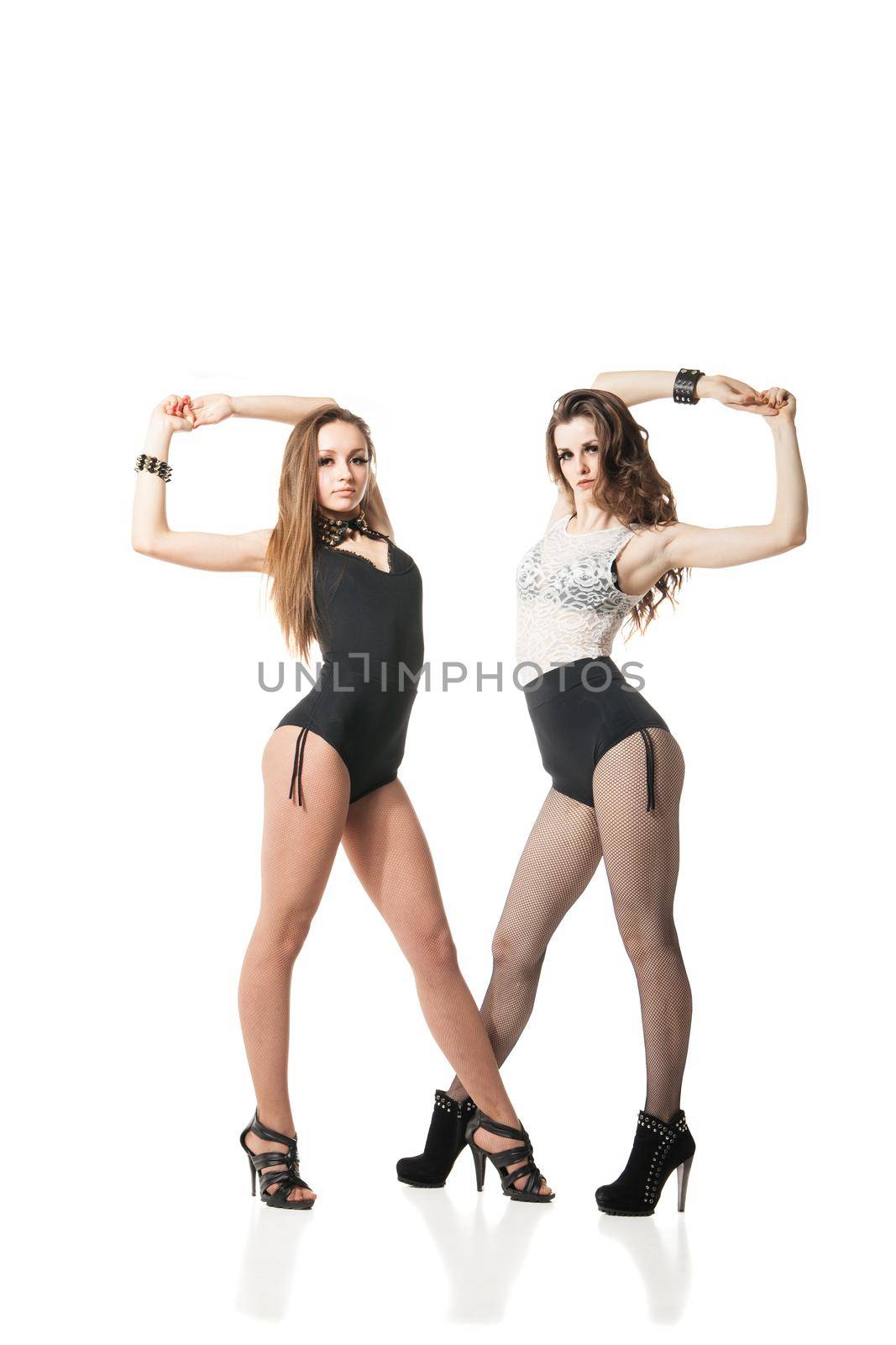 alluring go-go dancers woman posing isolated against white background