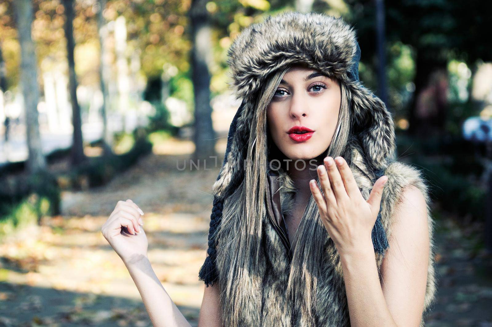 Portrait of beautiful girl with the winter hat on by javiindy