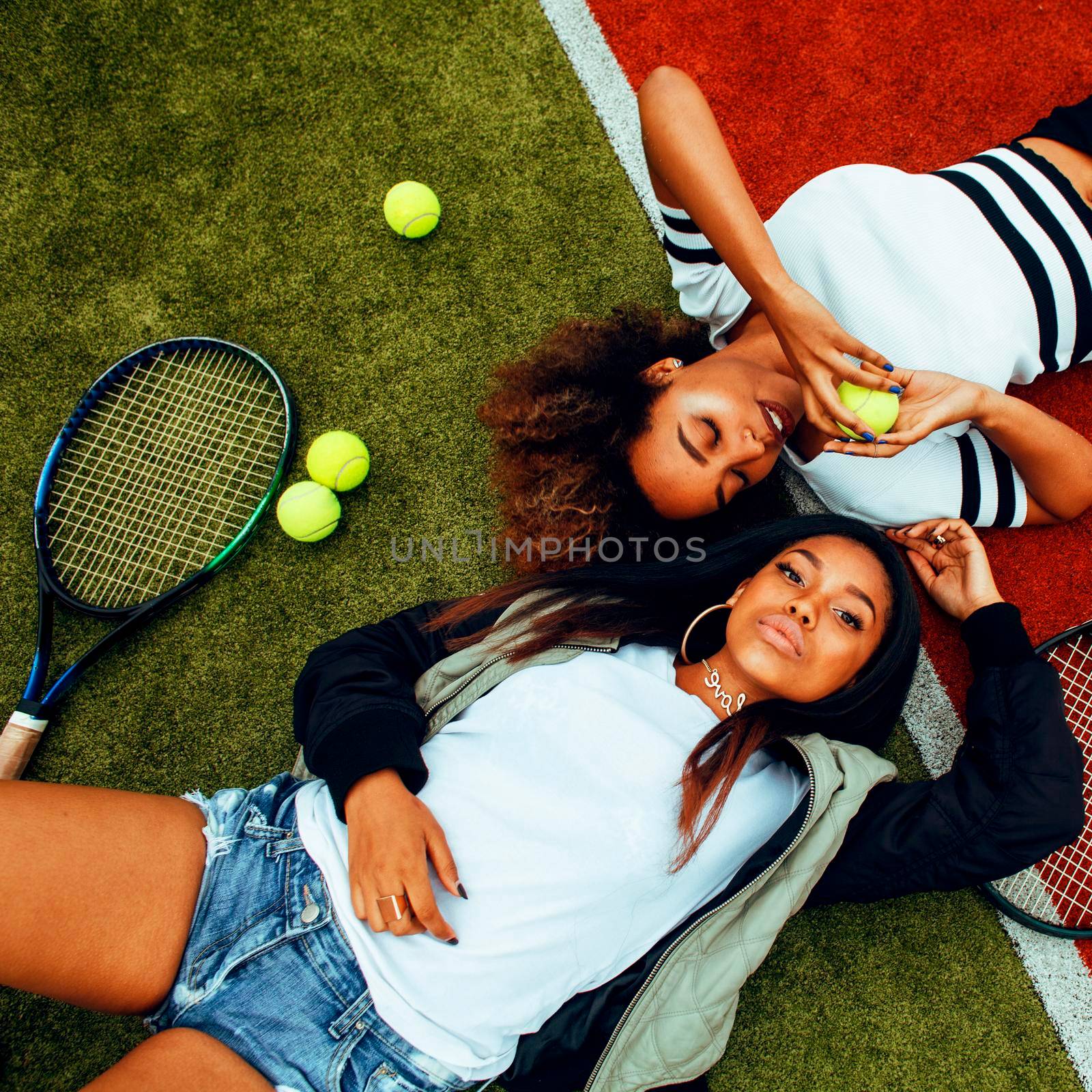 young pretty girlfriends hanging on tennis court, fashion stylish dressed swag, best friends happy smiling together lifestyle by JordanJ