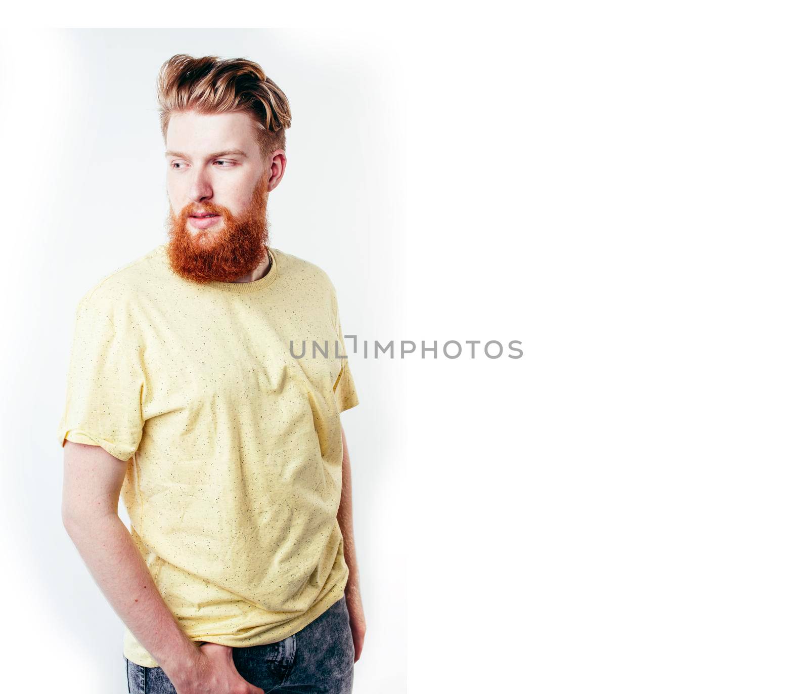 young handsome hipster ginger bearded guy looking brutal isolated on white background, lifestyle people concept close up