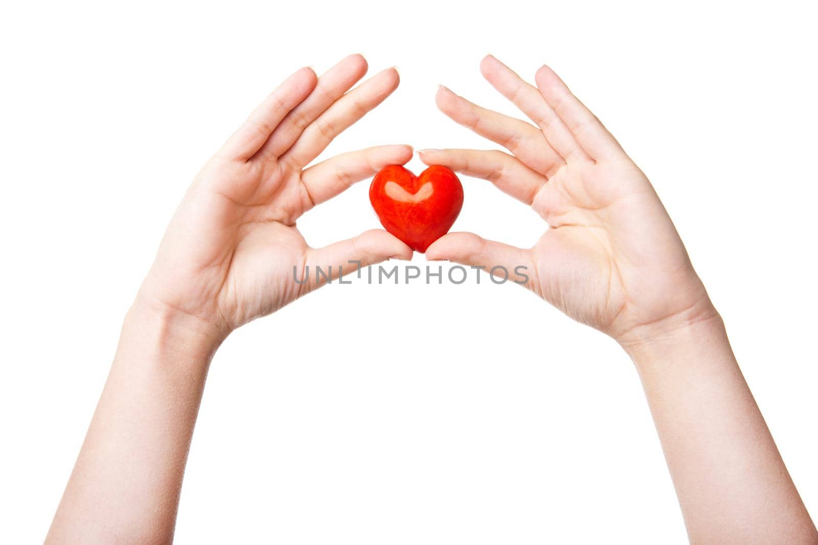 Woman's hand with heart symbol isolated on white