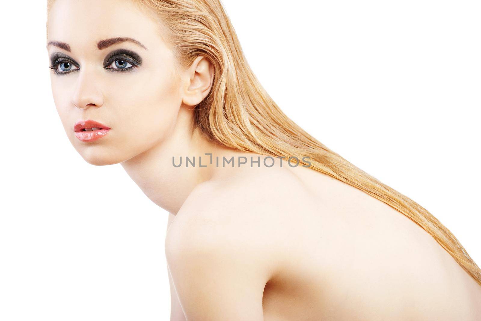 Beautiful young blond woman with beauty make-up over white background