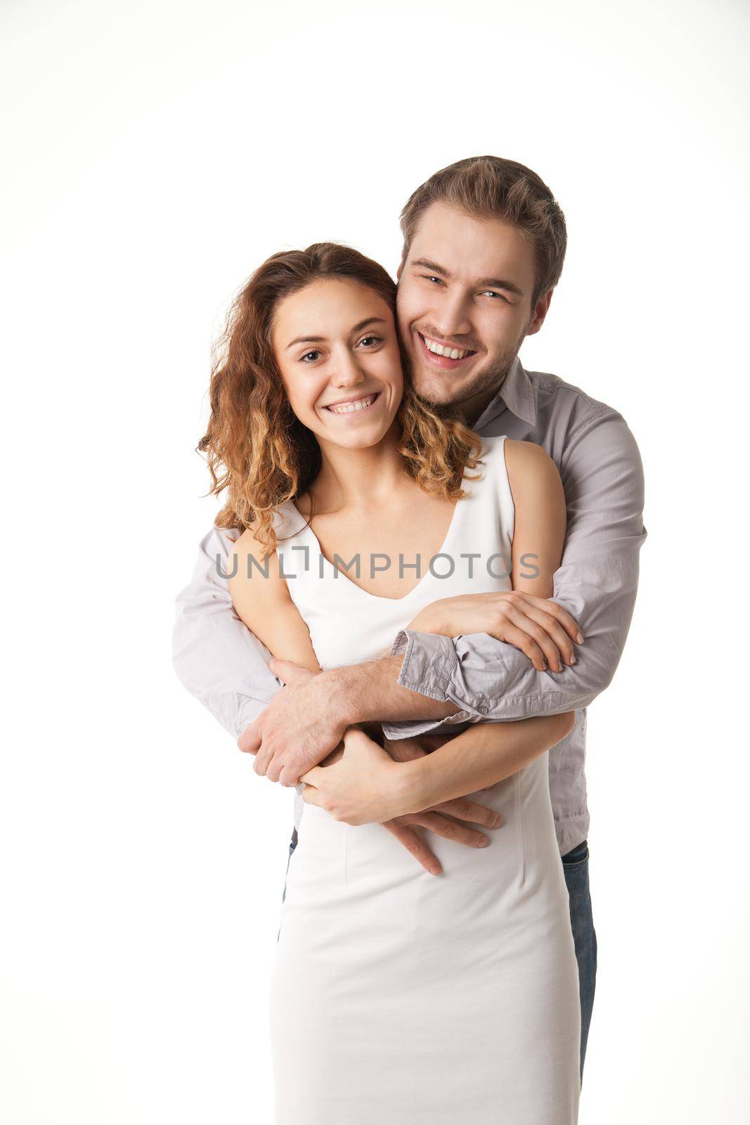 Portrait of happy couple isolated on white by Julenochek