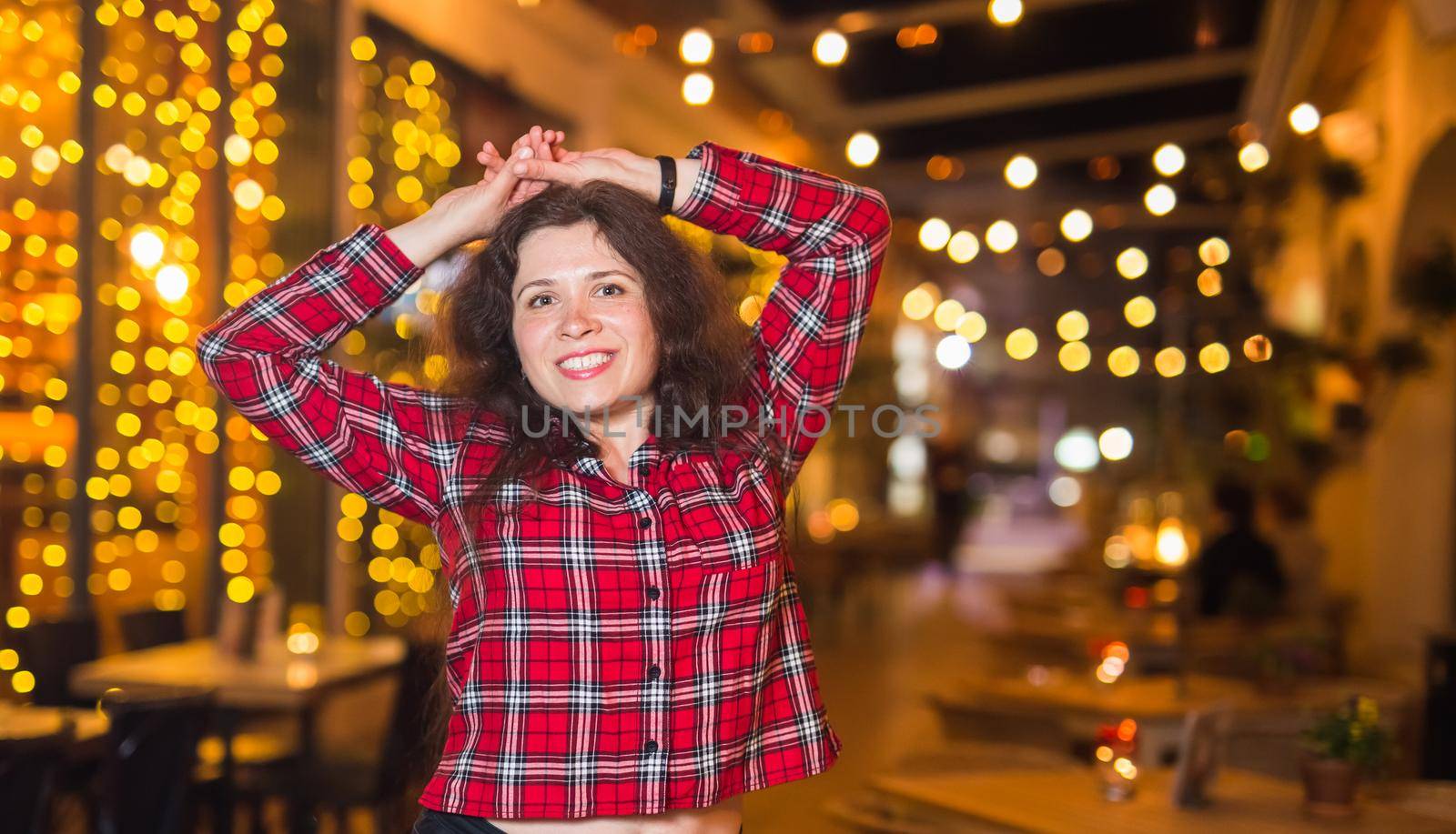 Young mother received a surprise from her daughter feeling excited open the mouth and looking at the gift in amazement in mother's day. Holidays, birthday and presents concept