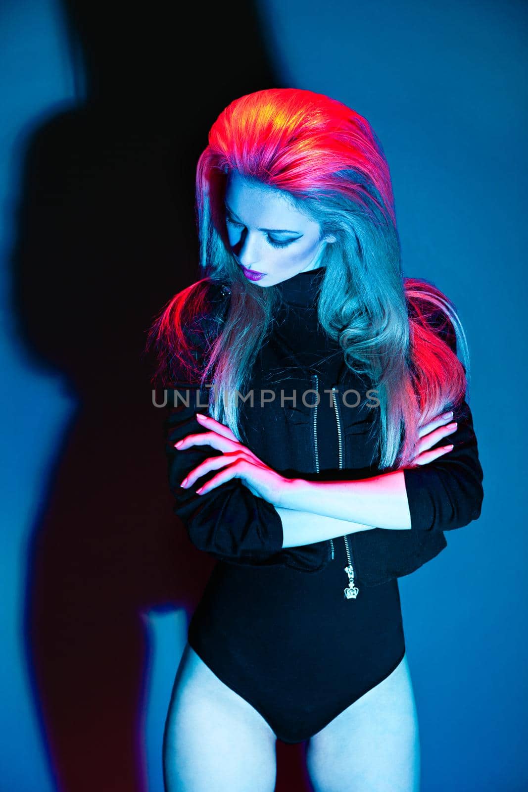 Fashion colorful shot of woman in leather jacket