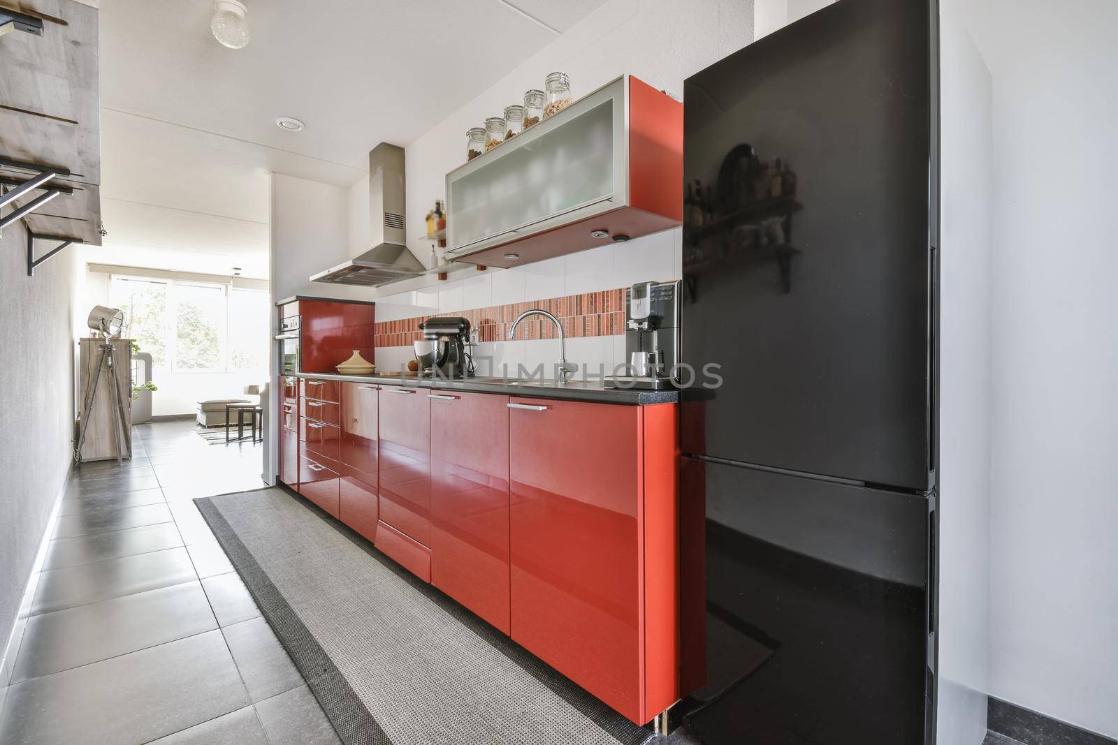 Stylish kitchen with red and black kitchen set