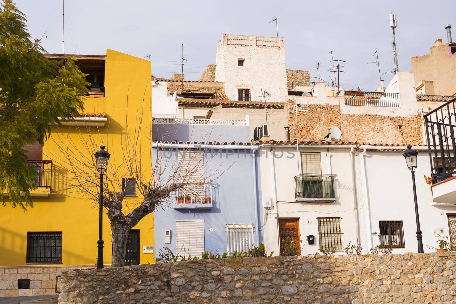 Travel, architecture and Mediterranean town concept - Spanish suburban street.