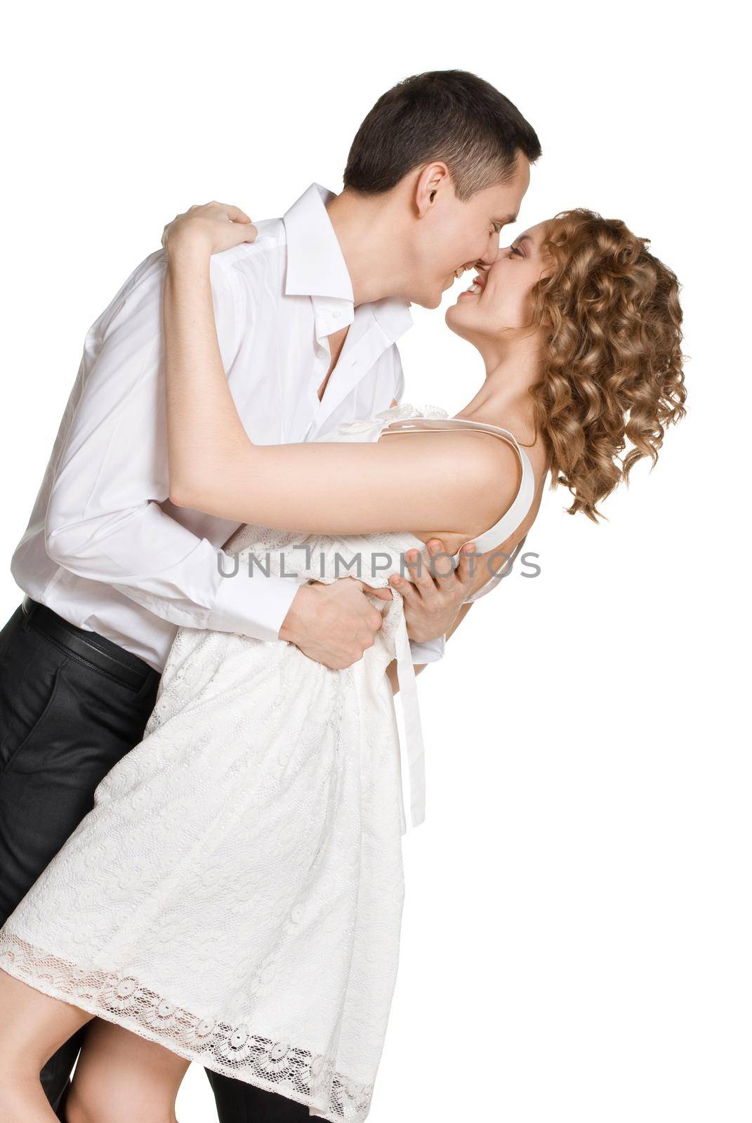 Happy smiling couple in love. Isolated over white background.