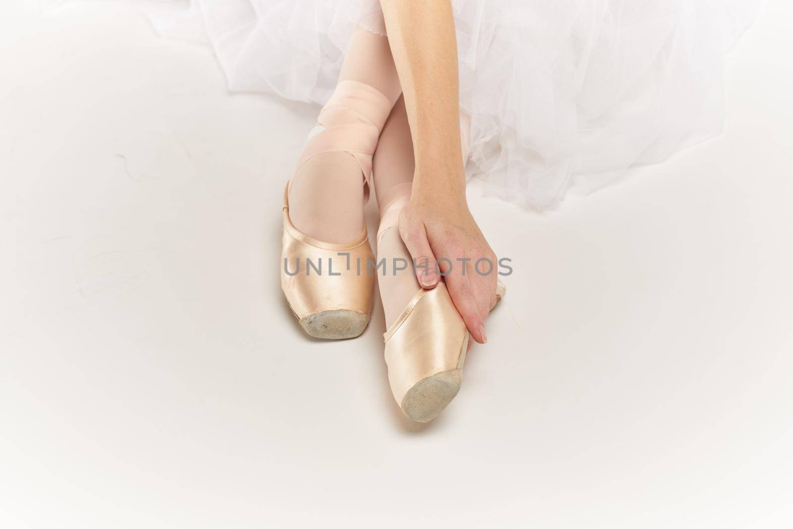 ballerina feet posing fashion exercise dance light background by Vichizh