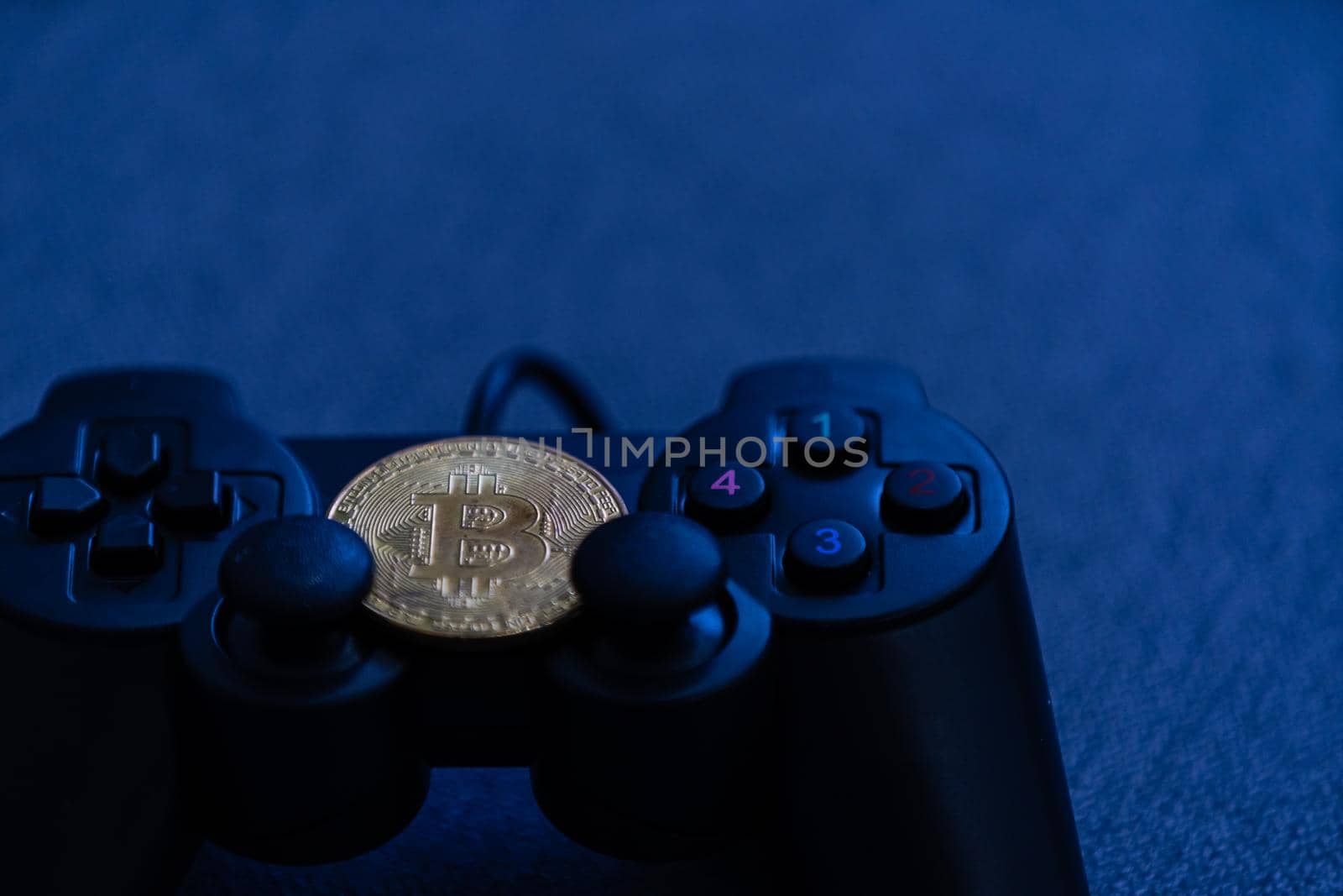 golden bitcoin coin on us dollars close up. High quality photo