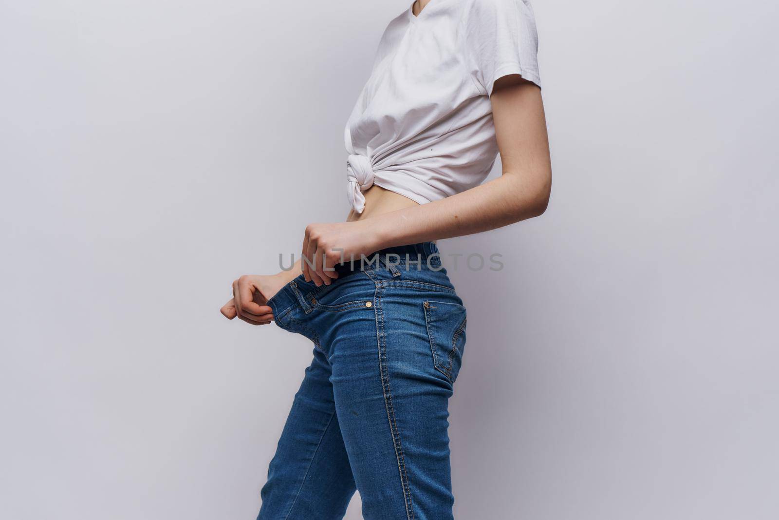 woman measure waist slim figure diet lifestyle. High quality photo