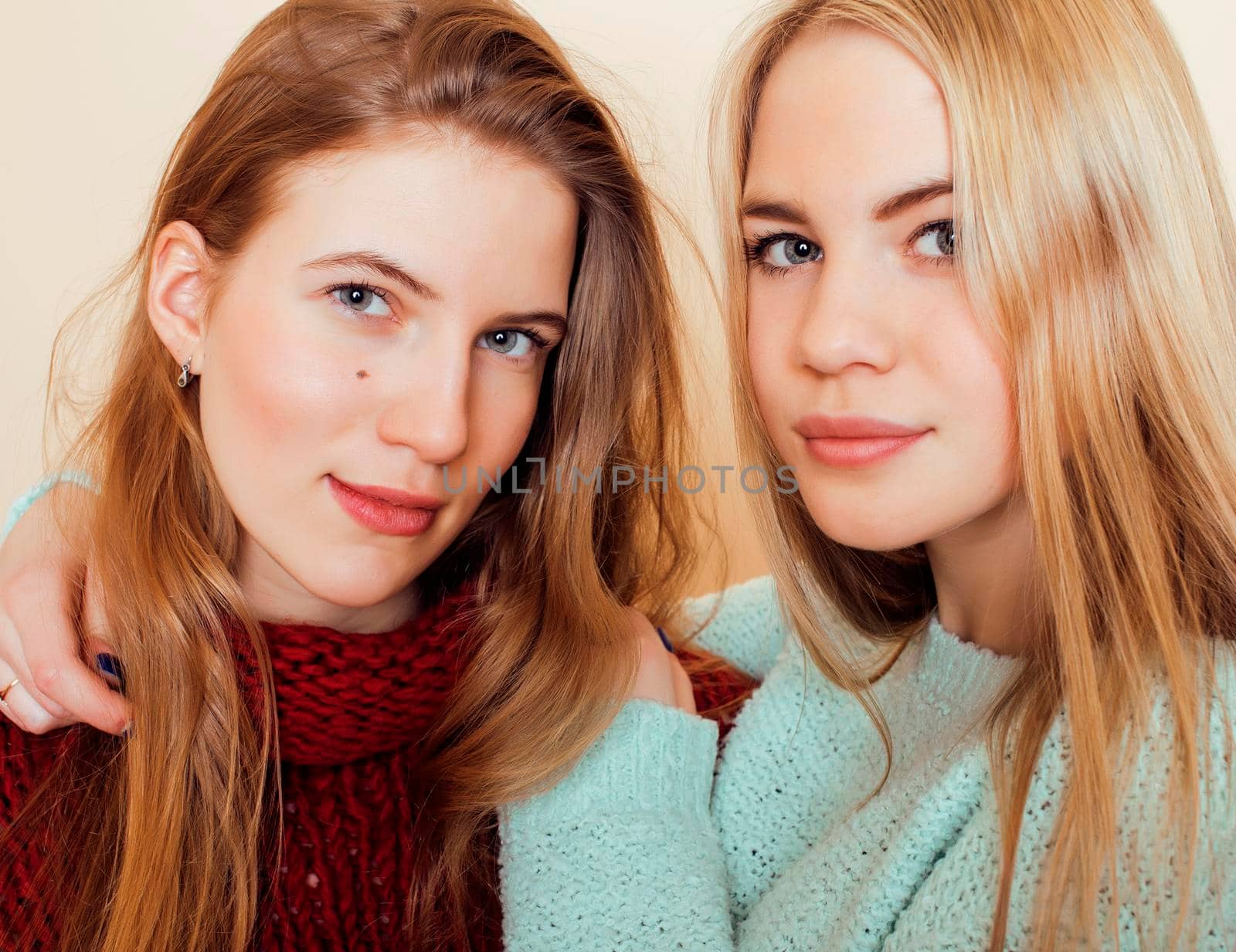 best friends teenage girls together having fun, posing emotional on white background, besties happy smiling, lifestyle real people concept close up. making selfie