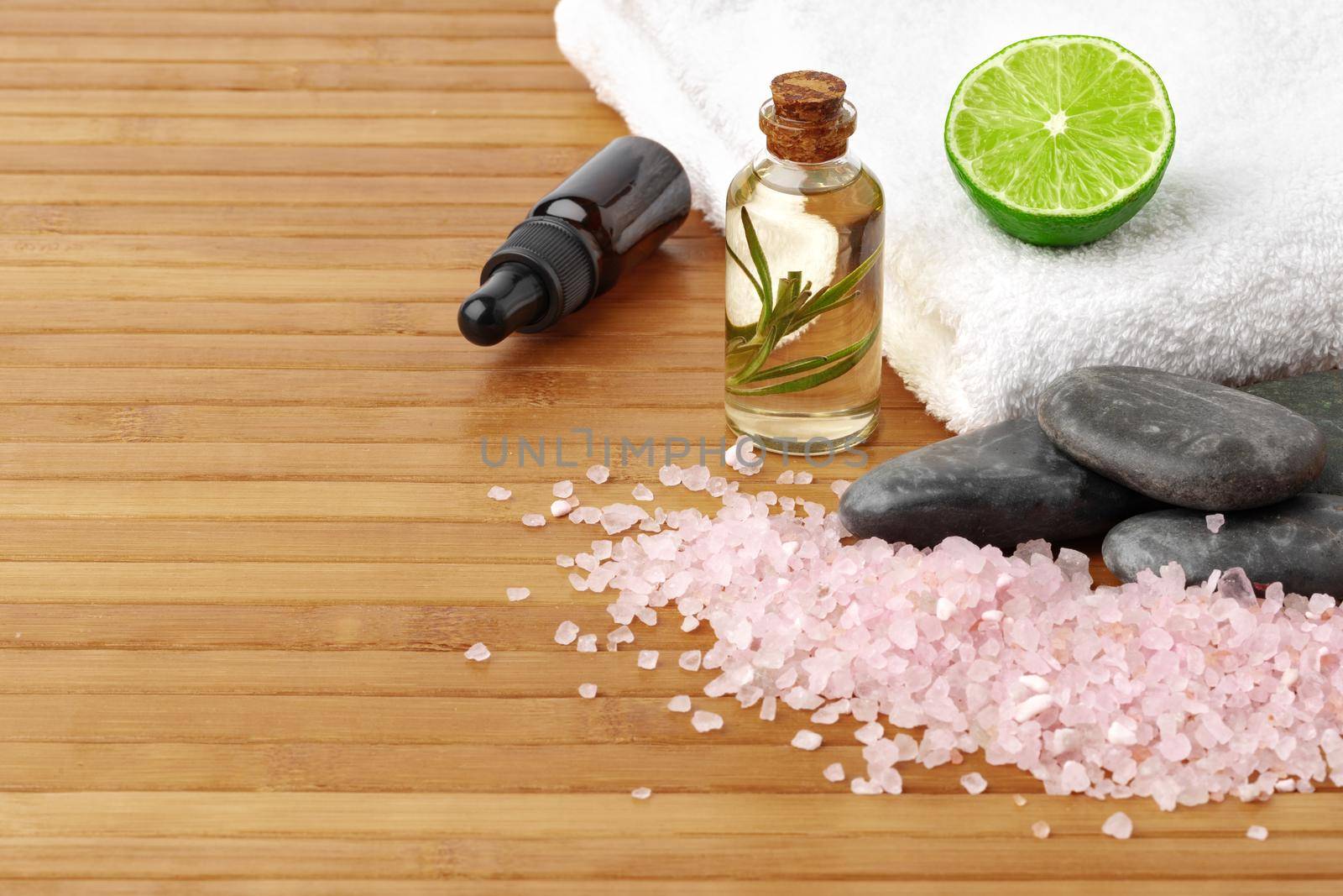 Beauty treatment items for spa procedures on wooden table, close up
