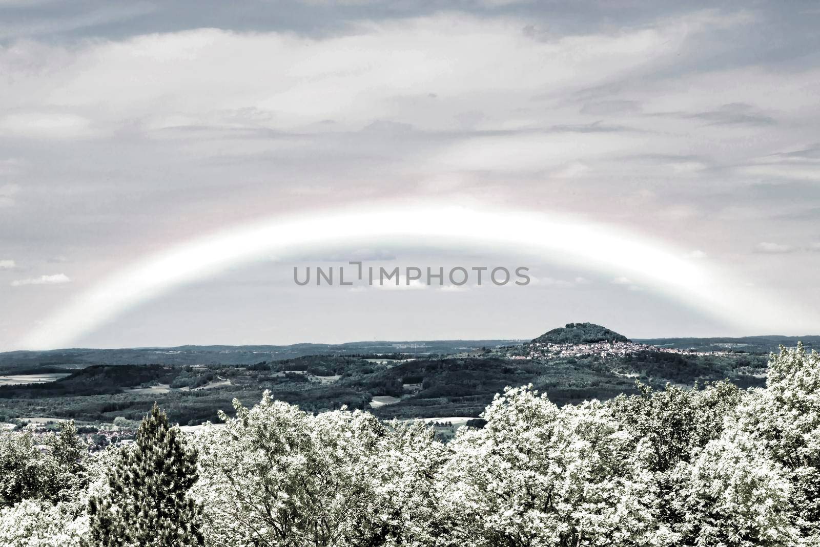 German emperor hill Hohenstaufen with rainbow in infrared colors