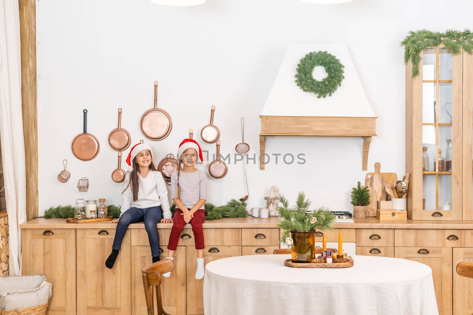 waiting for the holidays together. Little girls having fun.